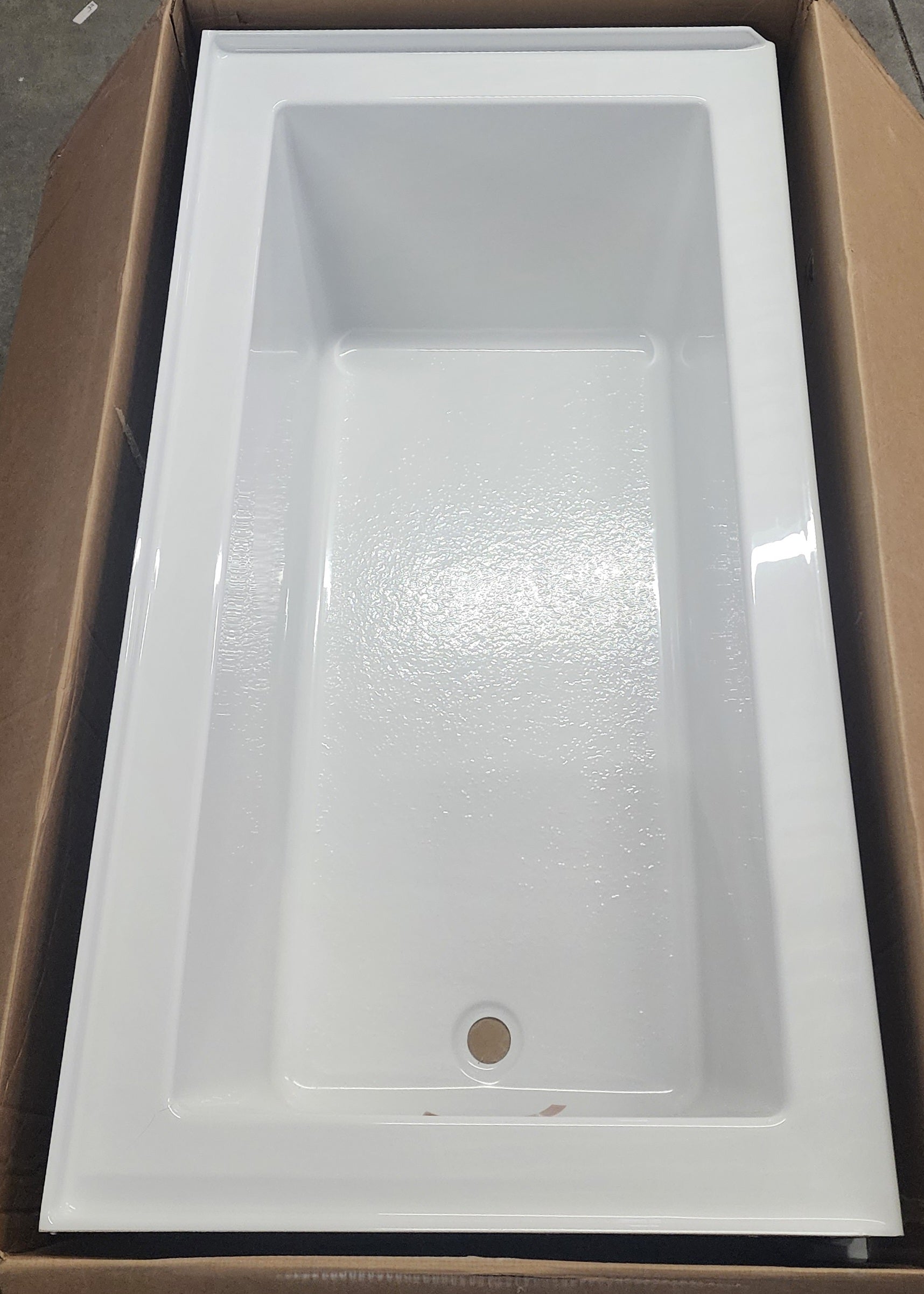 Left drain with slotted overflow for added safety. * Textured bottom surface ensures slip resistance. * Tub waste sold separately for convenience (available when adding to cart). * Includes integral lumbar support for enhanced comfort.