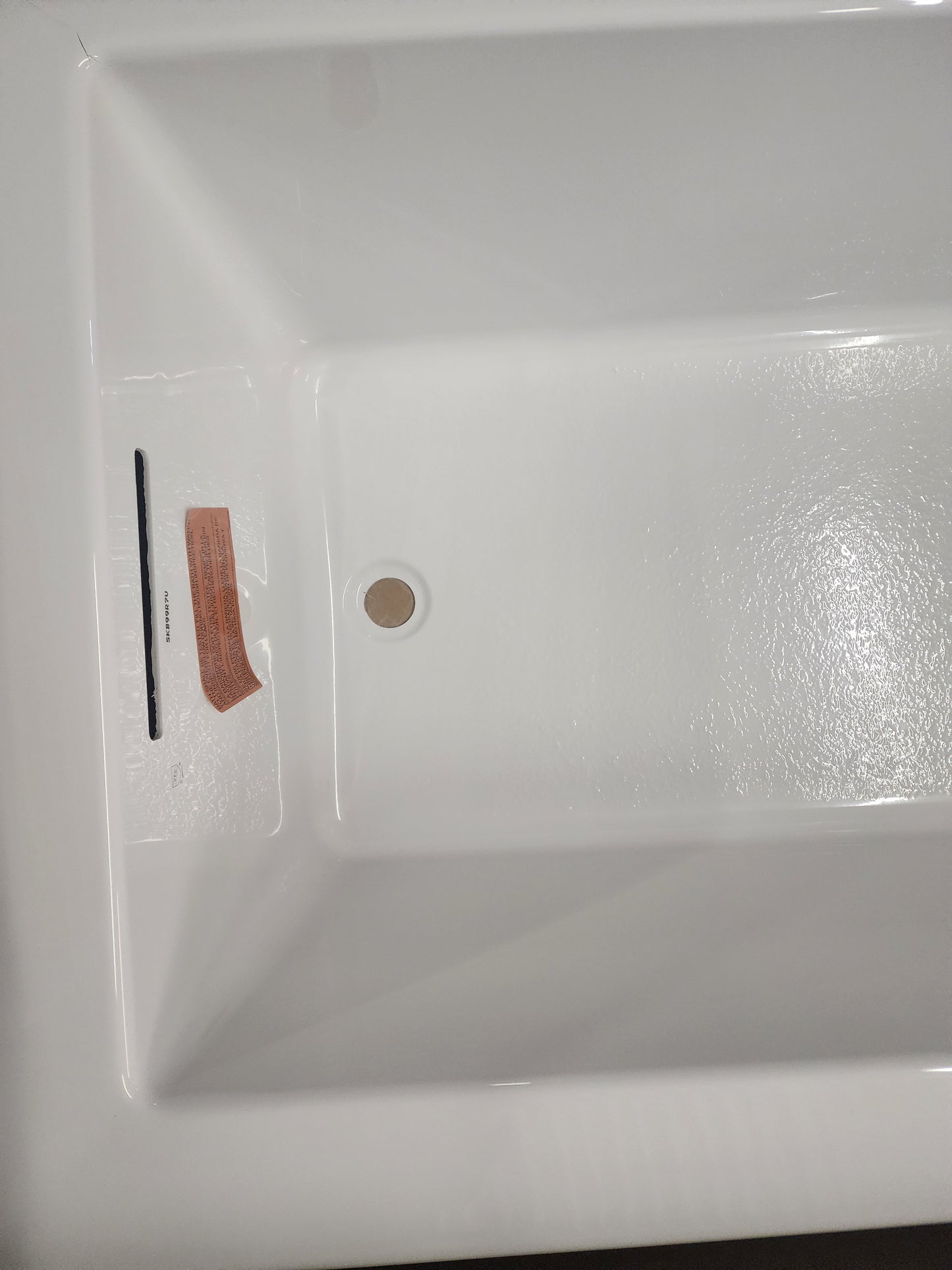 Left drain with slotted overflow for added safety. * Textured bottom surface ensures slip resistance. * Tub waste sold separately for convenience (available when adding to cart). * Includes integral lumbar support for enhanced comfort.