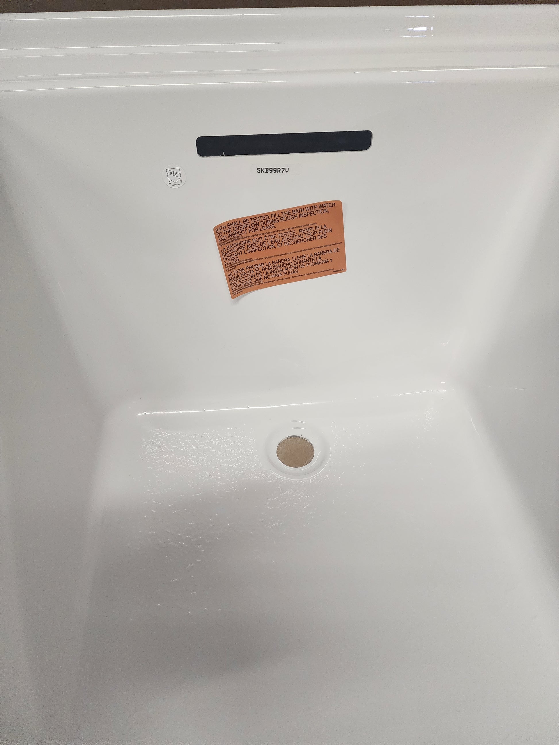 Left drain with slotted overflow for added safety. * Textured bottom surface ensures slip resistance. * Tub waste sold separately for convenience (available when adding to cart). * Includes integral lumbar support for enhanced comfort.